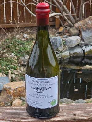 A bottle of Michaud Farms homemade apple cider vinegar